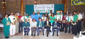 The various award winners and cricket board officials at the Guyana Cricket Board annual awards ceremony on Friday night at the Umana Yana. (Lawrence Fanfair photograph) 