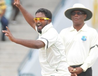 Guyana off-spinner Narsingh Deonarine appealing to umpire Vincent Bullen during his seven-wicket haul against Barbados. [Barbados Nation photo)